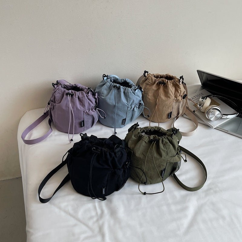 Lightweight and casual crossbody bag drawstring opening - zoraflux