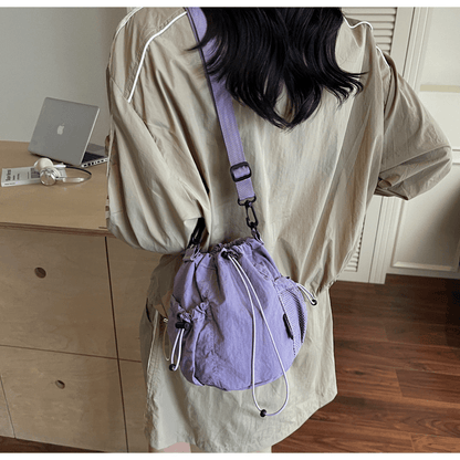 Lightweight and casual crossbody bag drawstring opening - zoraflux
