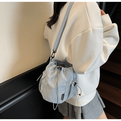 Lightweight and casual crossbody bag drawstring opening - zoraflux