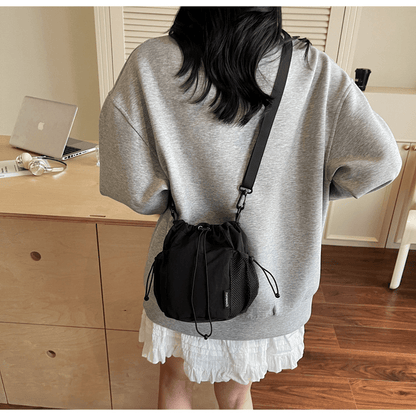 Lightweight and casual crossbody bag drawstring opening - zoraflux