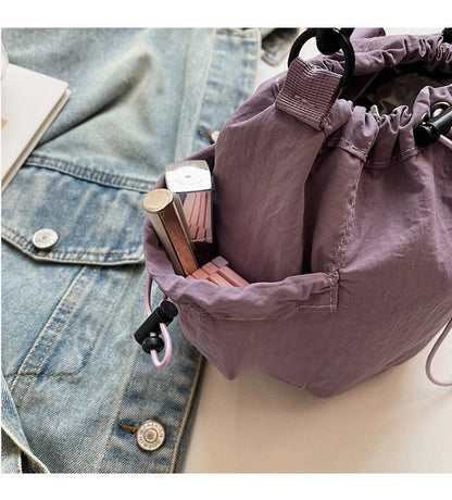 Lightweight and casual crossbody bag drawstring opening - zoraflux