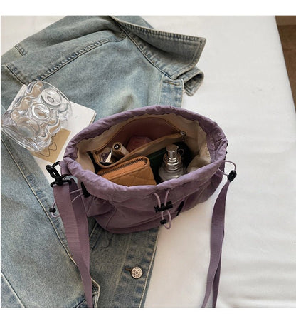 Lightweight and casual crossbody bag drawstring opening - zoraflux