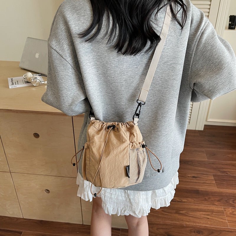 Lightweight and casual crossbody bag drawstring opening - zoraflux