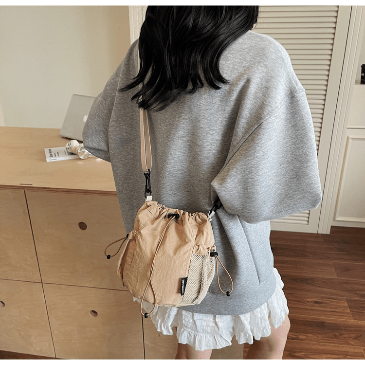 Lightweight and casual crossbody bag drawstring opening - zoraflux