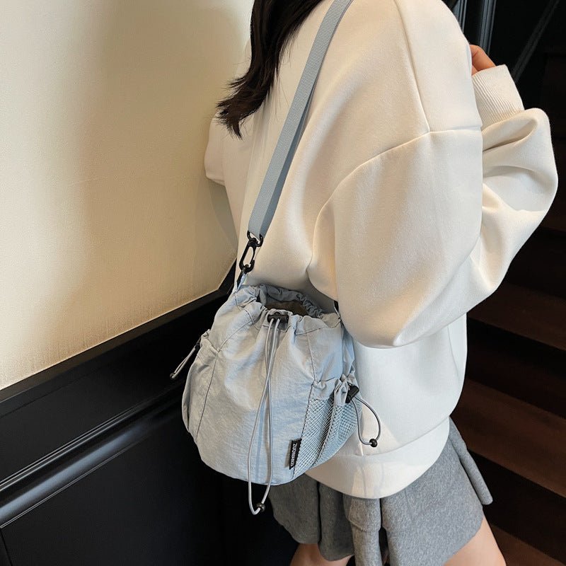 Lightweight and casual crossbody bag drawstring opening - zoraflux