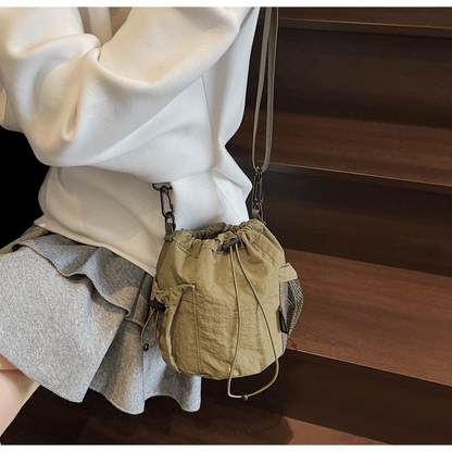 Lightweight and casual crossbody bag drawstring opening - zoraflux