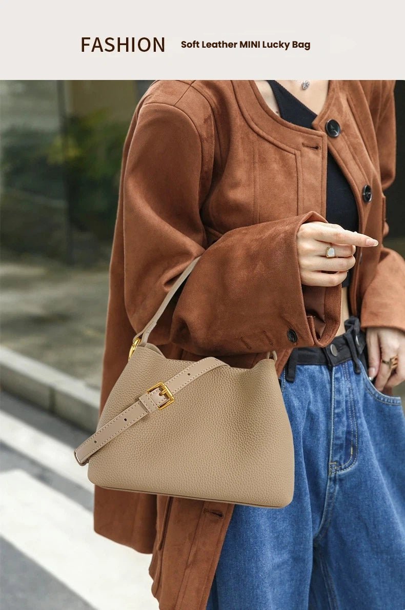 Soft cowhide magnetic buckle hand - held bucket bag - zoraflux