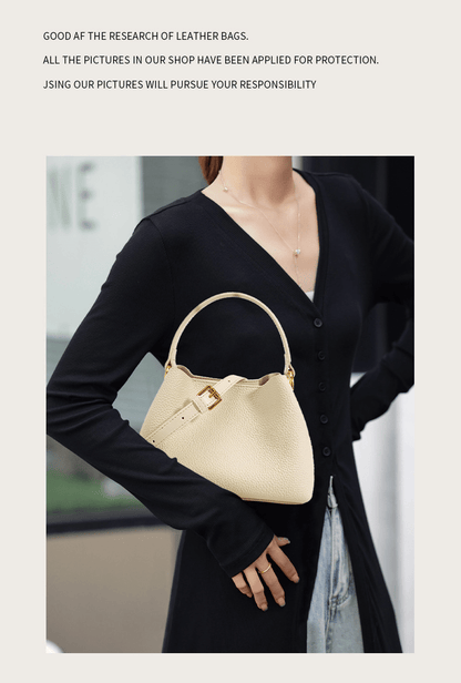 Soft cowhide magnetic buckle hand - held bucket bag - zoraflux